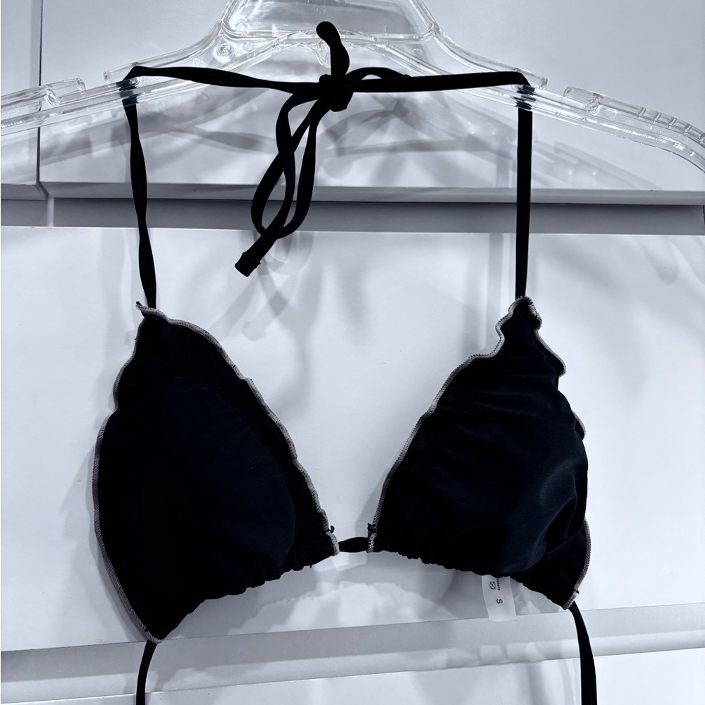 Elegant Black Halter Bikini Top with a tan outer lining
